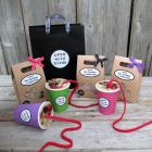 A splendid feast of 3 Nutty Puddings for hanging from a branch or fence, and 3 bags of Premium Nutty Sprinkles - ideal for sprinkling on bird tables or on the ground