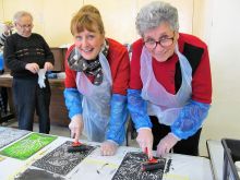 Printing Workshop - suited and booted in aprons, oversleeves and disposable gloves!  People learned how to transfer an image onto a printing block then got busy inking up and printing!