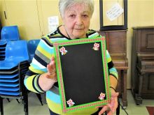 Decorative Chalkboards.  These are always handy to have at home.  People learn how to apply paint, ribbons and buttons to a simple frame.  They take home their own unique Chalkboard, along with a chalk marker to write on it.